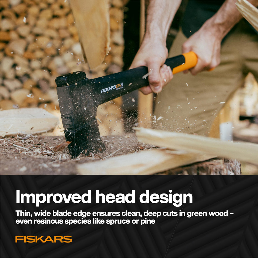 Fiskars X24 axe in use chopping wood