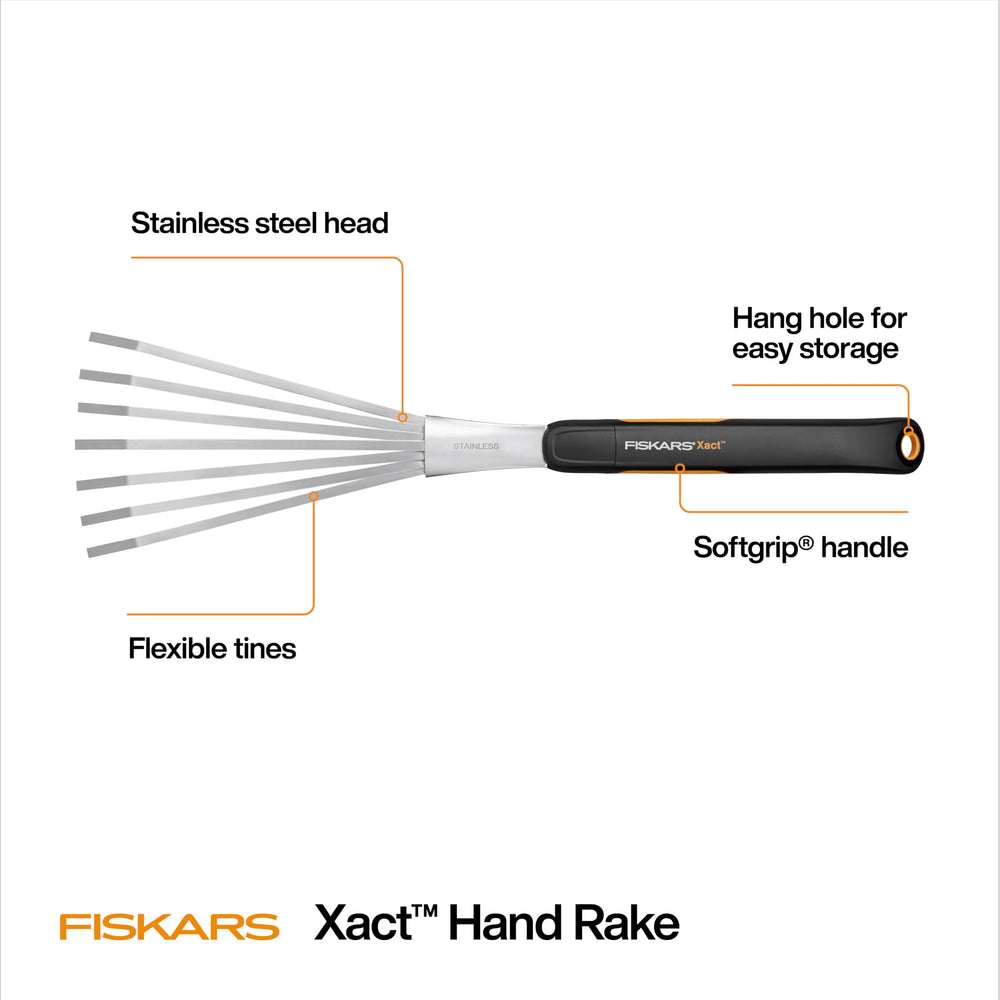 Fiskars Xact Hand Rake displayed on a garden table