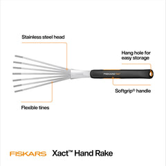 Fiskars Xact Hand Rake displayed on a garden table