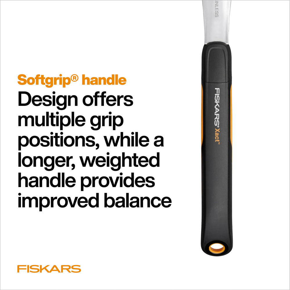 Fiskars Xact Hand Rake in a gardening toolkit