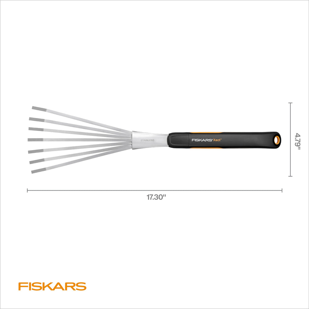Fiskars Xact Hand Rake packaging on display