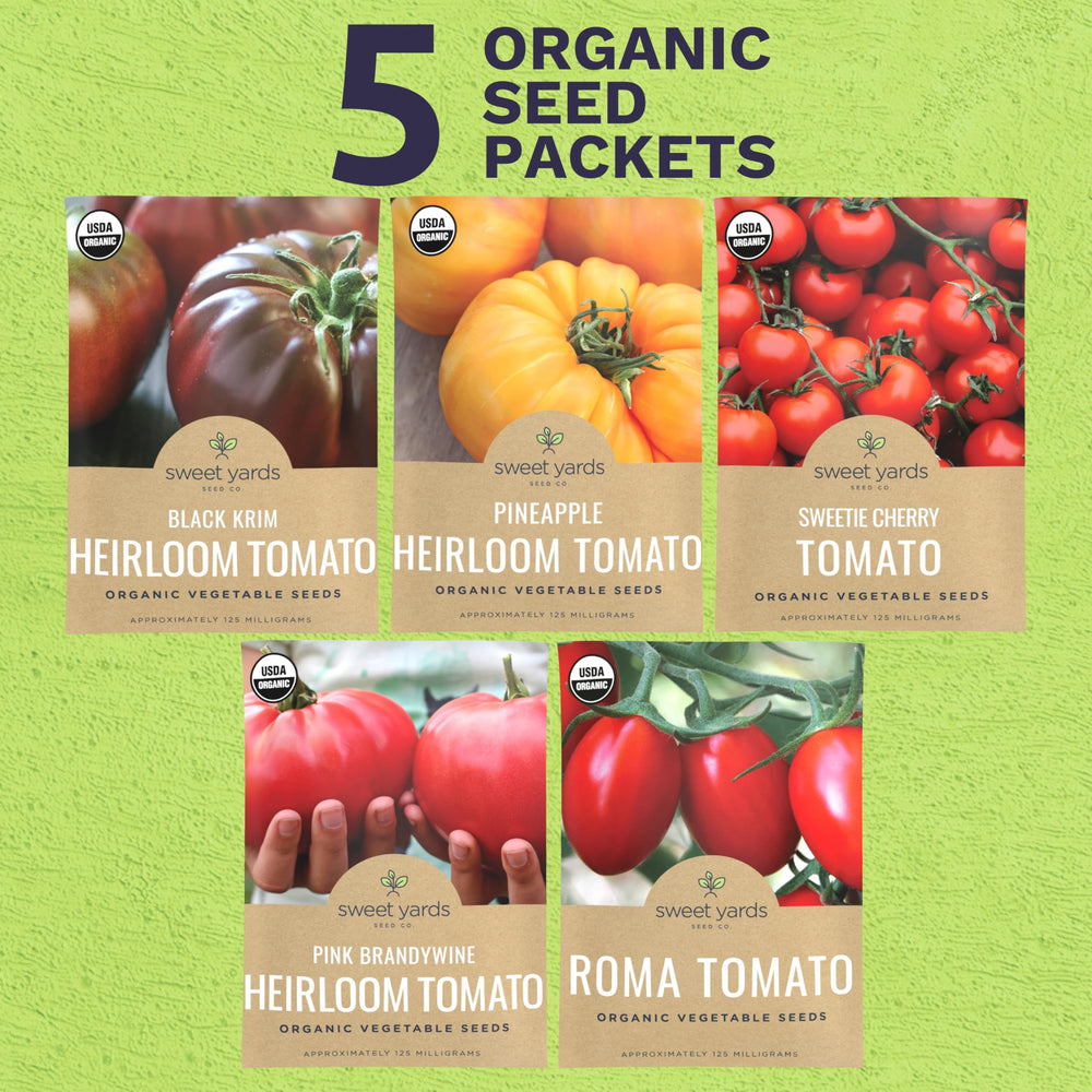 Five individual seed packets of different tomato varieties
