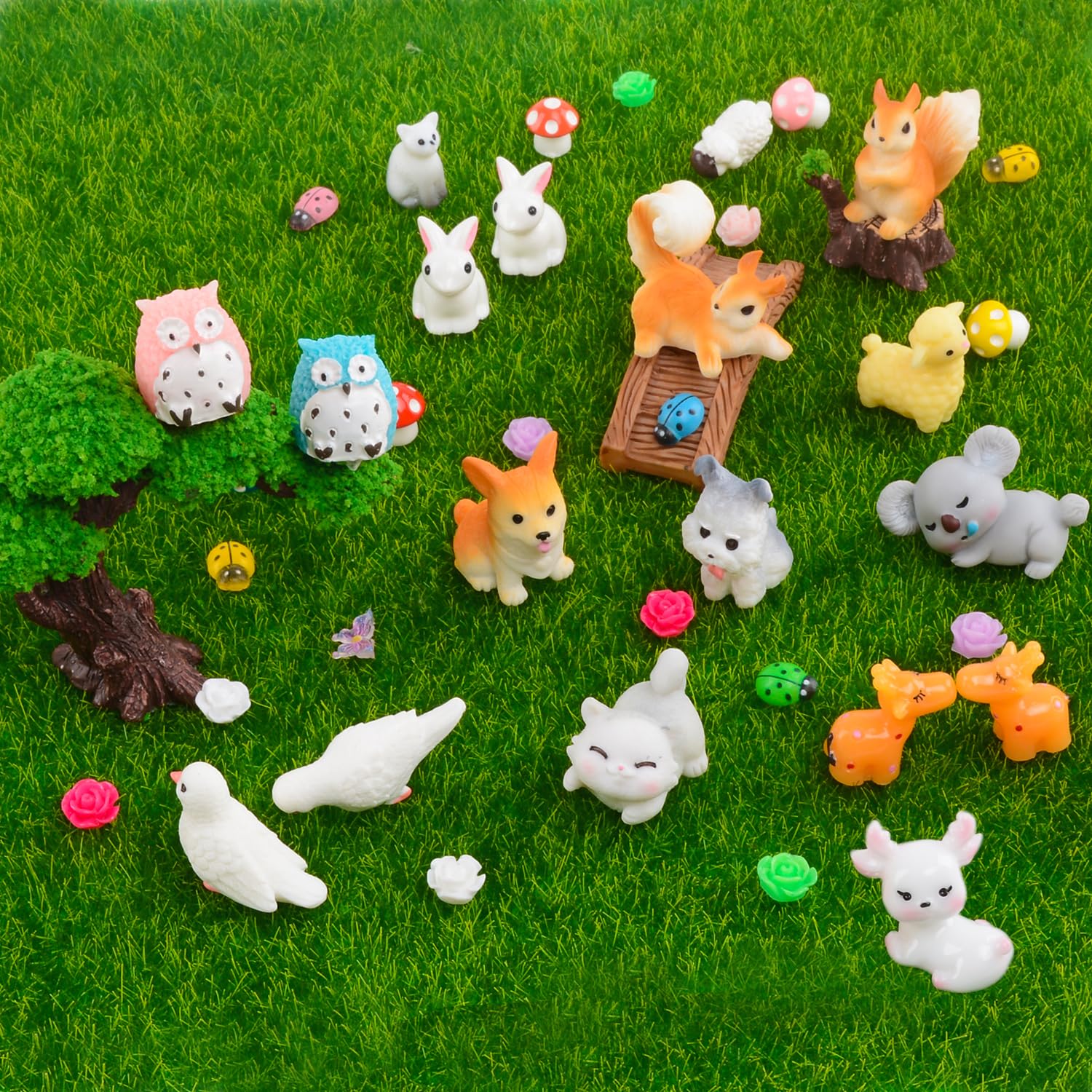 Flat lay of U-Zimikee mini resin animals on a table