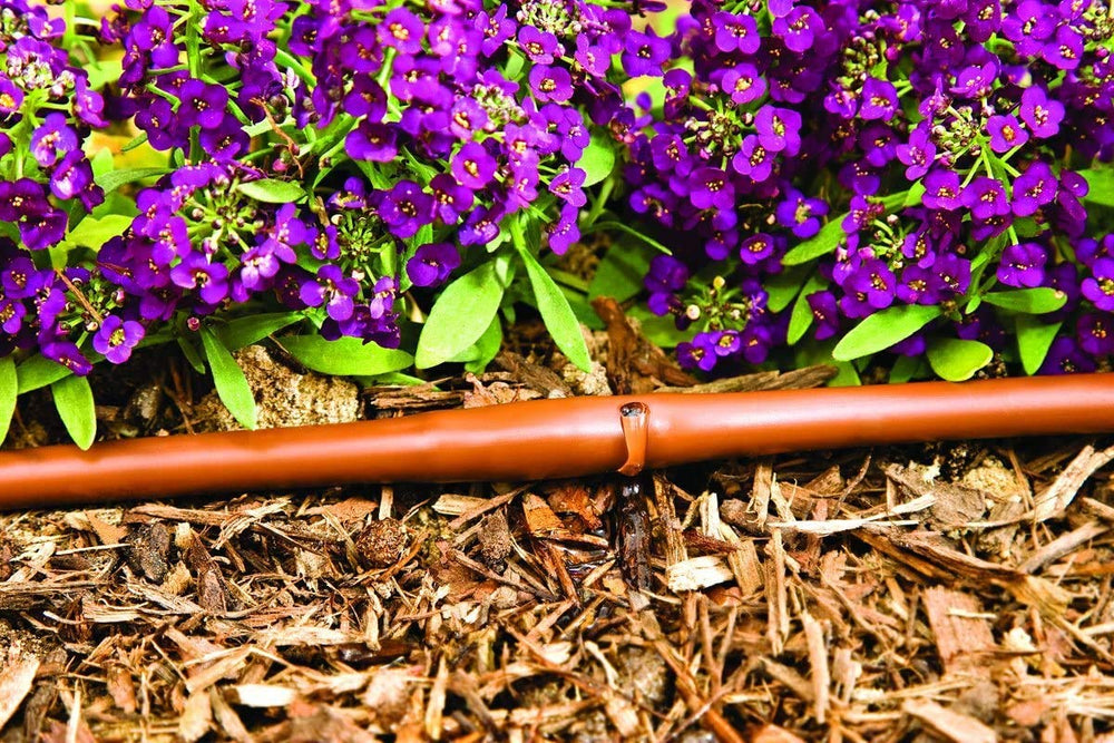Flexible tubing of One Stop Outdoor Dripline with barbed fittings