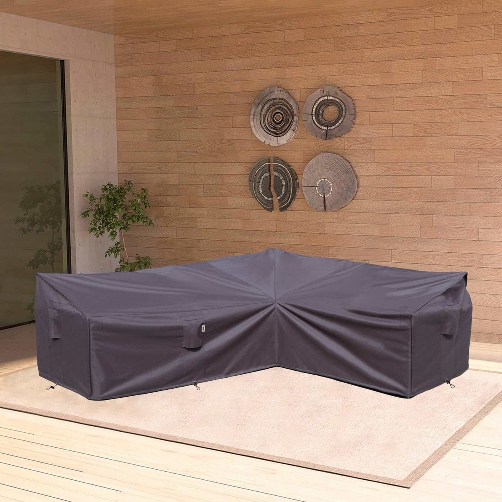 Flexiyard sofa cover secured on a sectional sofa outdoors