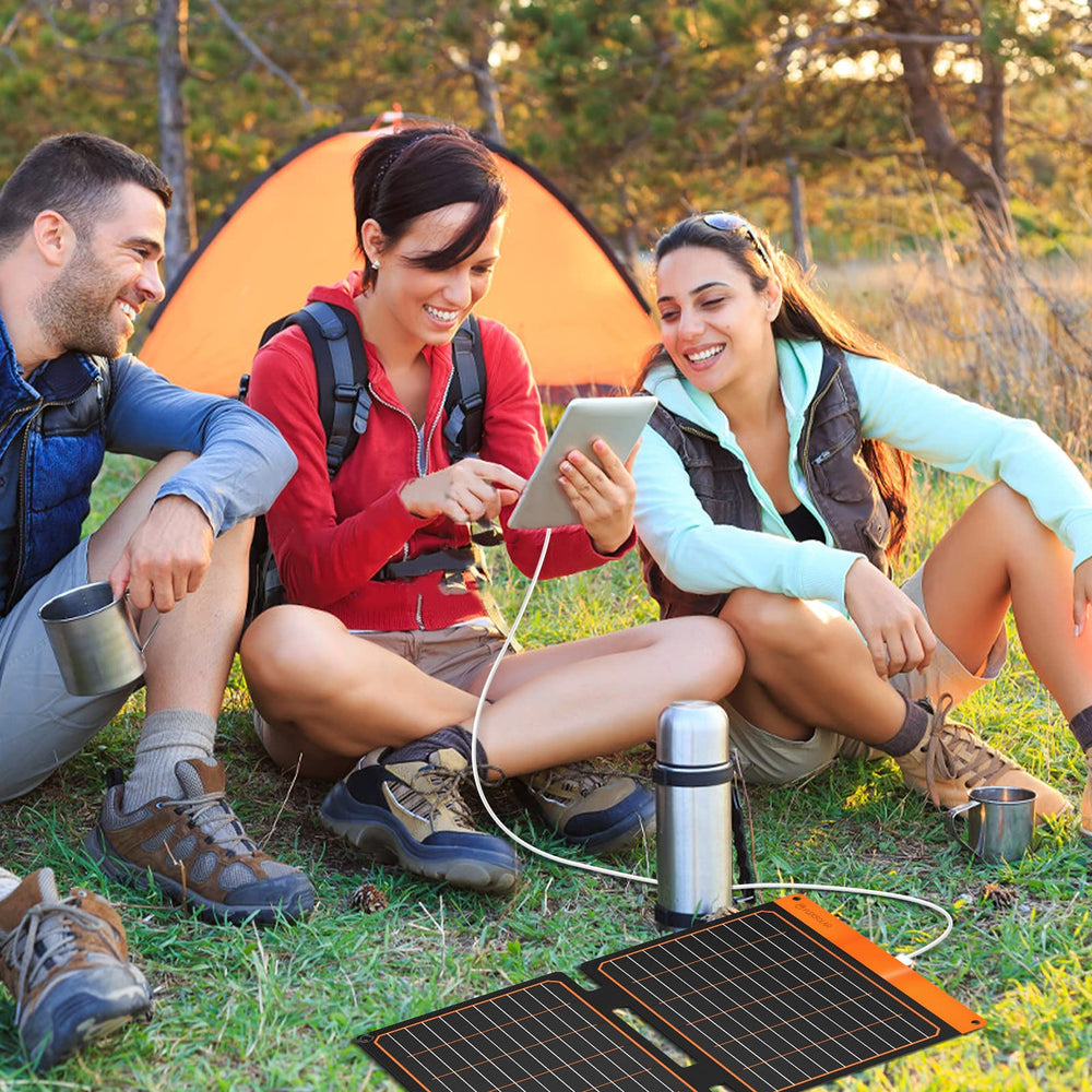 FlexSolar 20W Portable Solar Panel Charger showing charging status LED