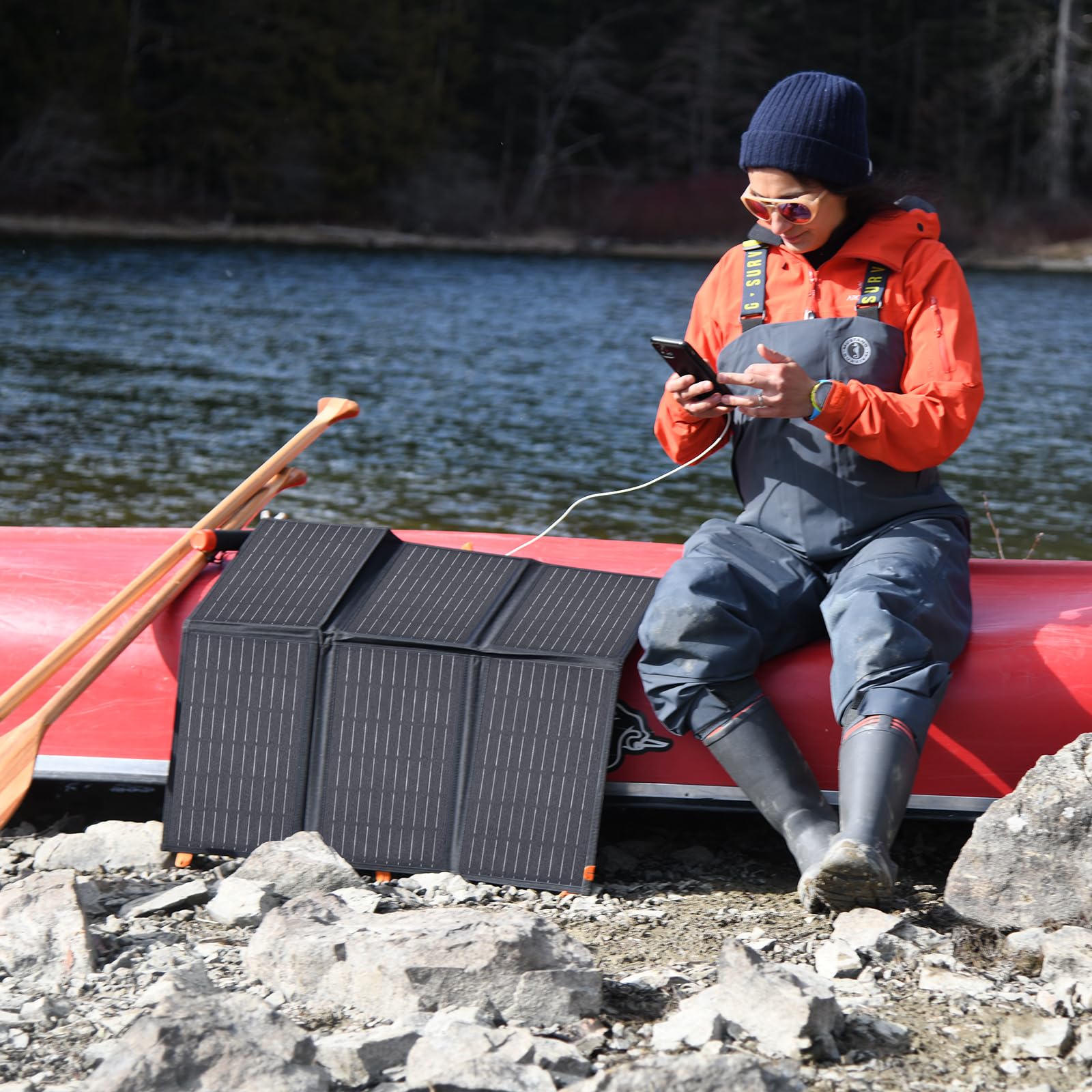 FlexSolar 60W Portable Solar Panel Charger in use with devices