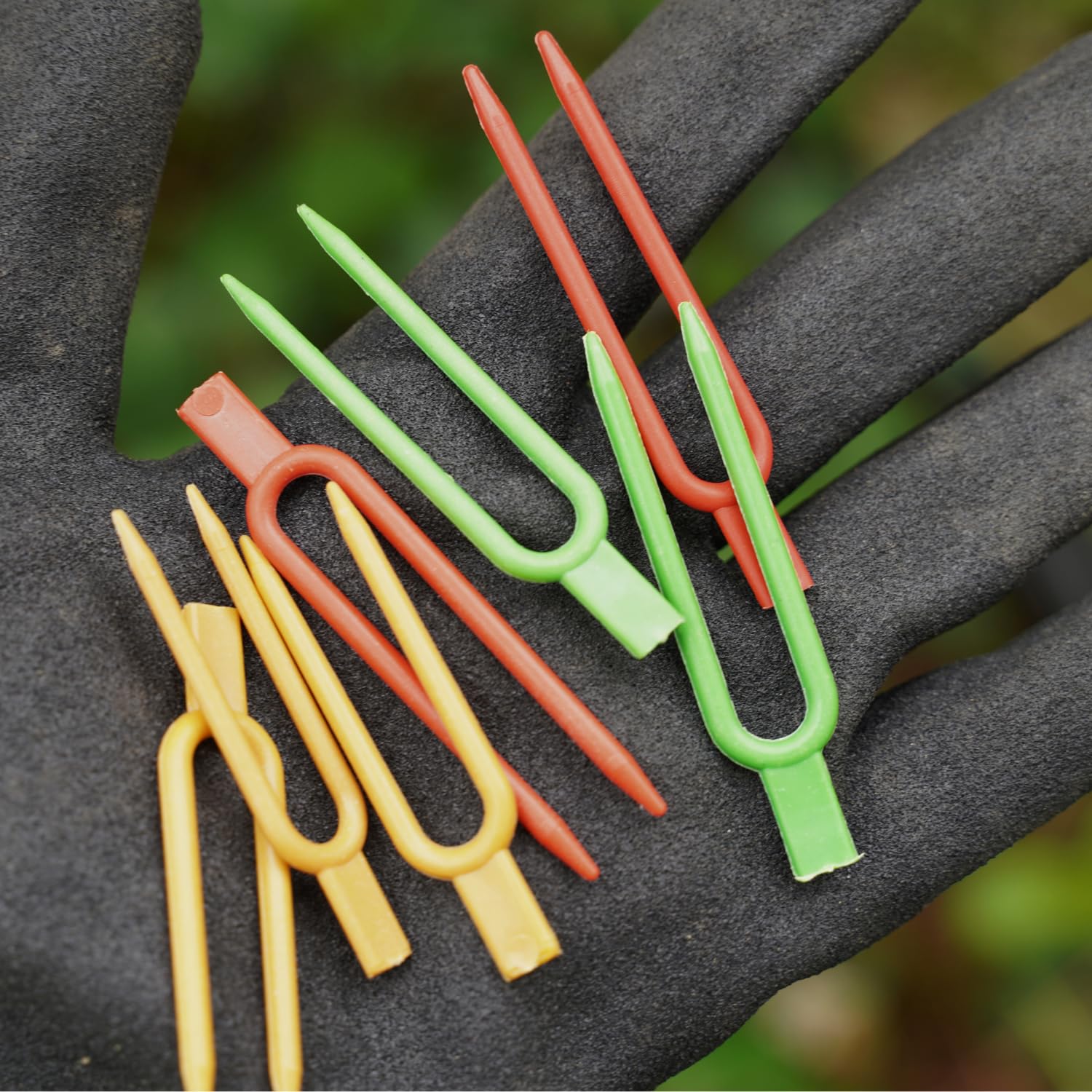 Foinfun plant support pins displayed with various plants in garden