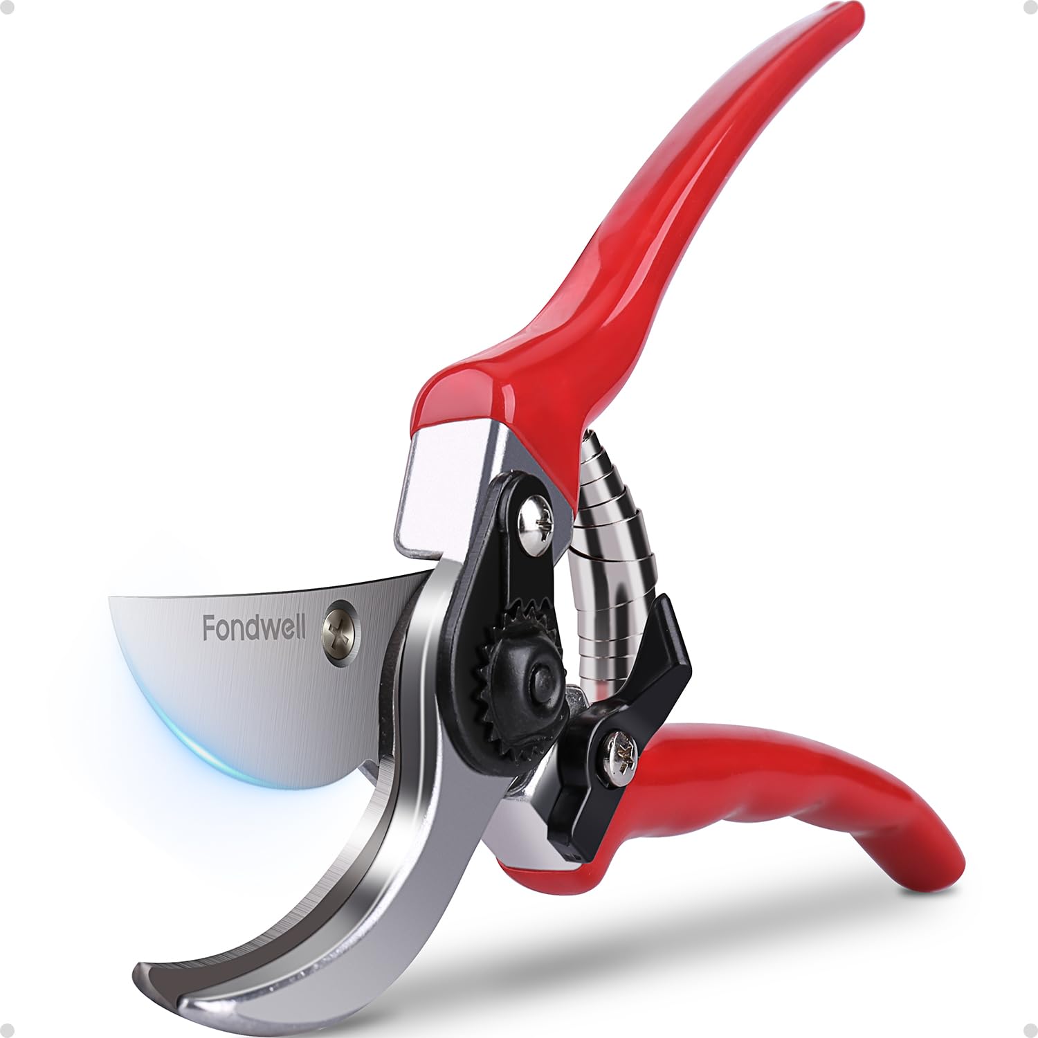 Fondwell red pruning shears on a garden table