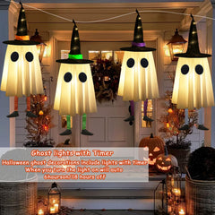Four CYSKXYI glowing witch hat lights displayed outdoors