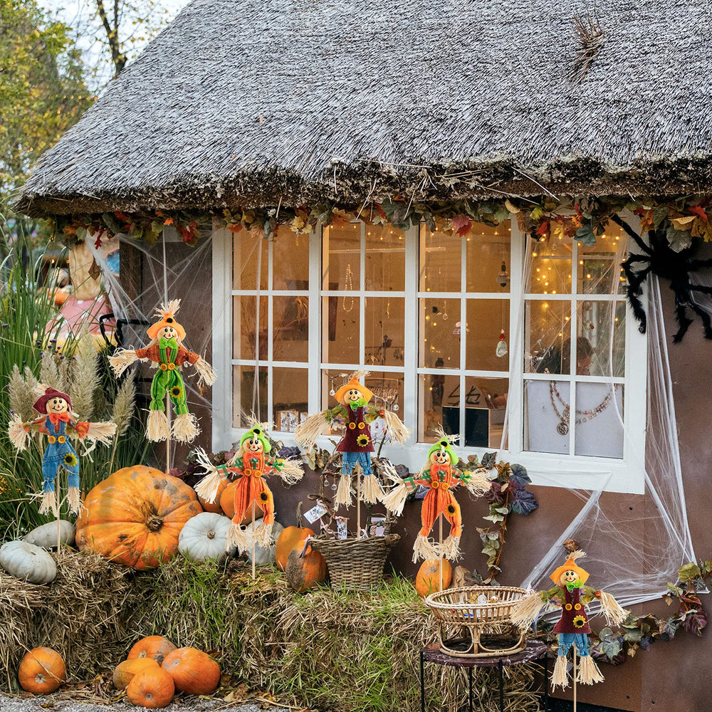 Four different styles of ZAUGONTW Halloween scarecrows lined up
