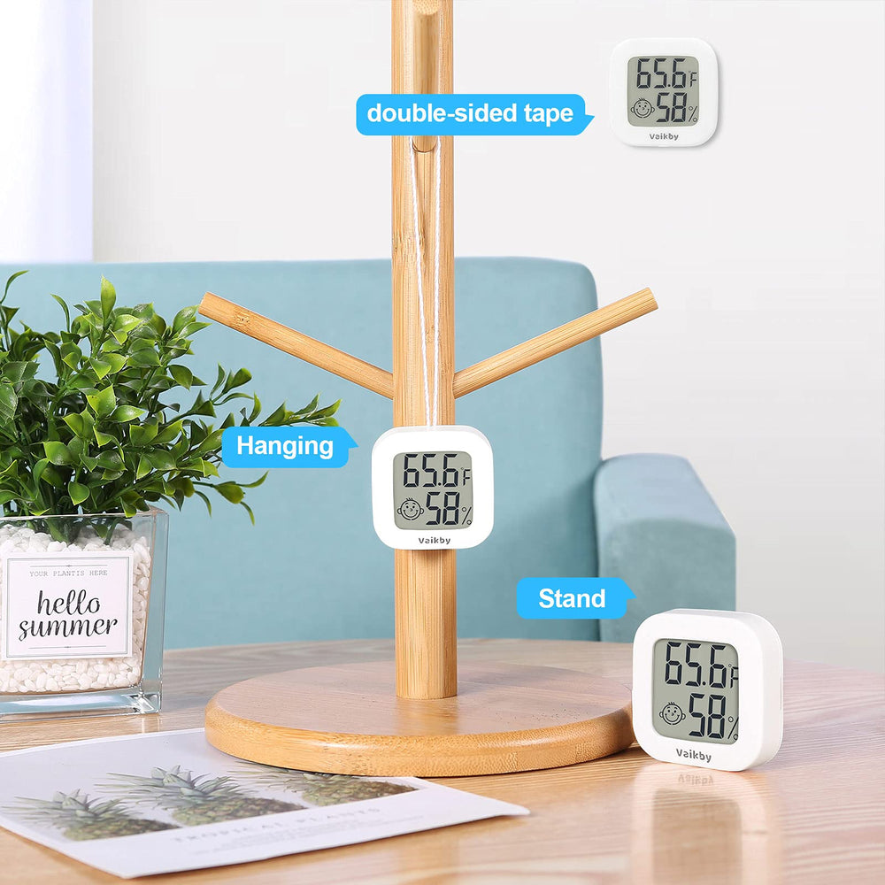 Four Vaikby thermometers displayed together on a table