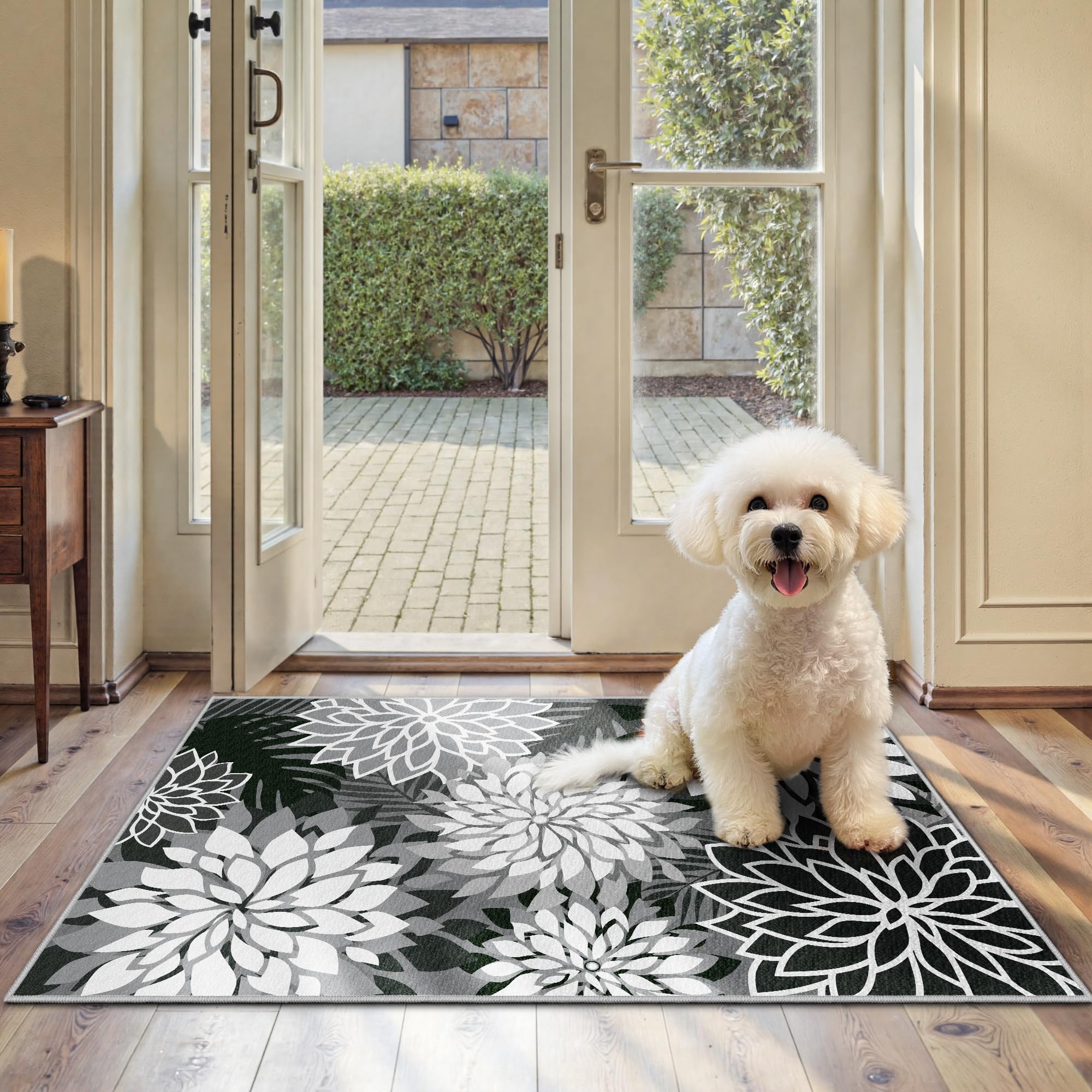 Front view of Arenarug Outdoor Rug 2' x 3' black floral pattern