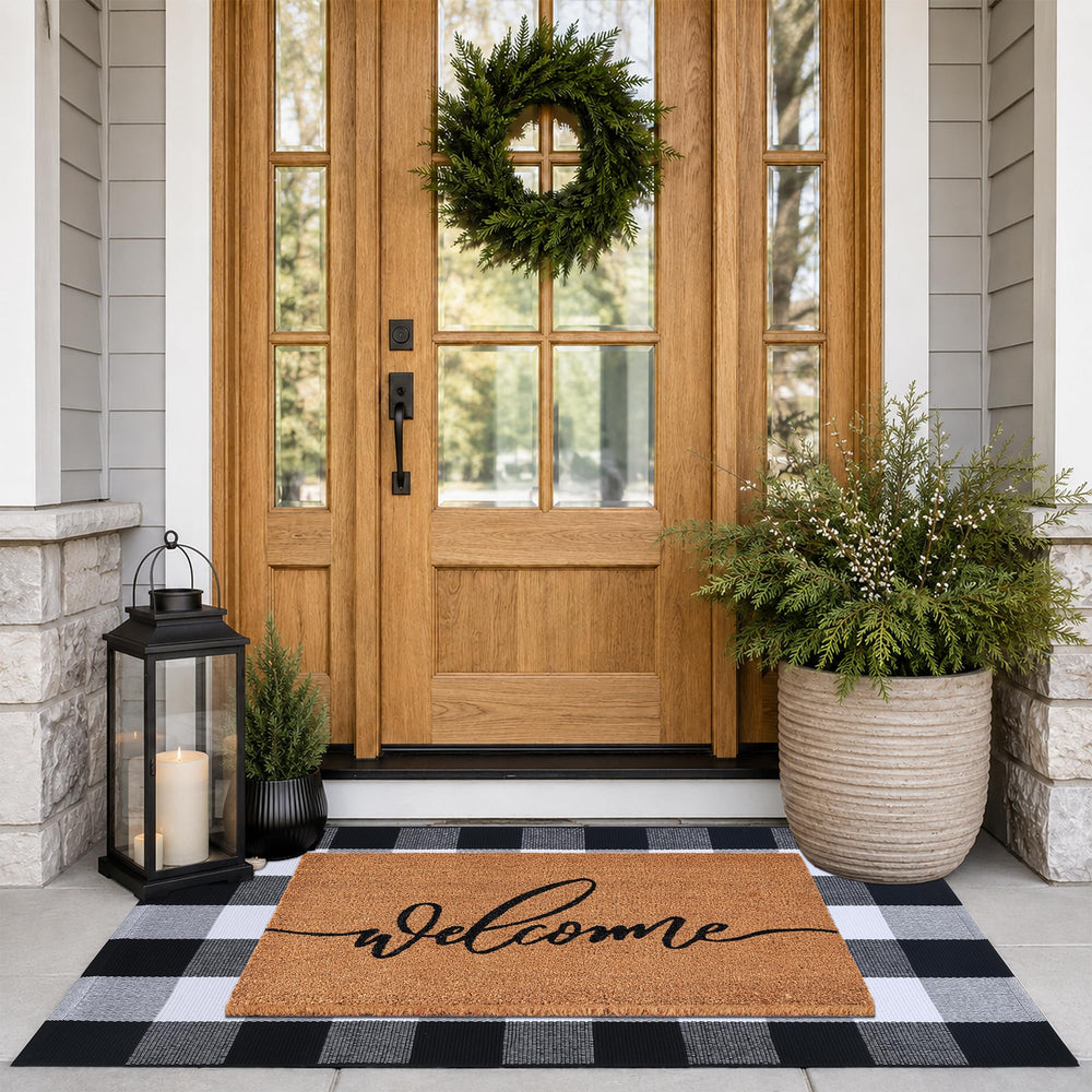 Front view of Fallovea Welcome Door Mat with black and white plaid rug