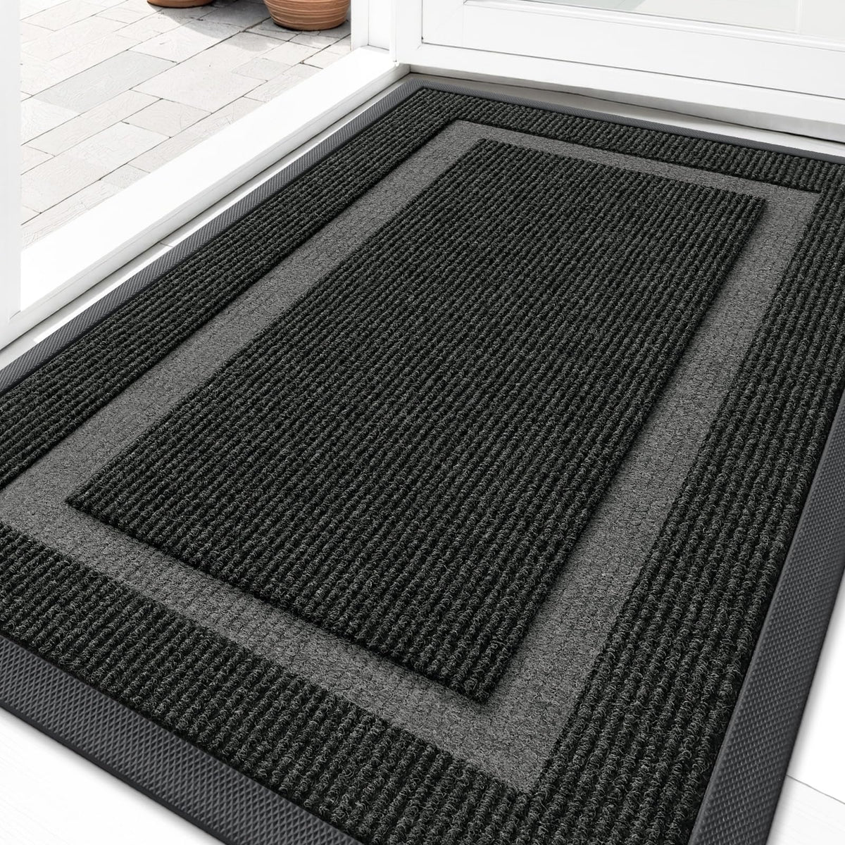 Front view of OLANLY 29.5x17 heavy-duty doormat in black