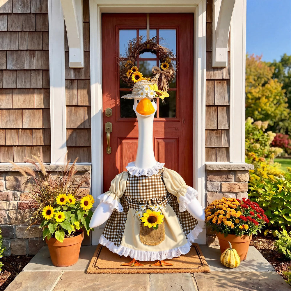 Front view of plaid dress and straw hat for goose statue