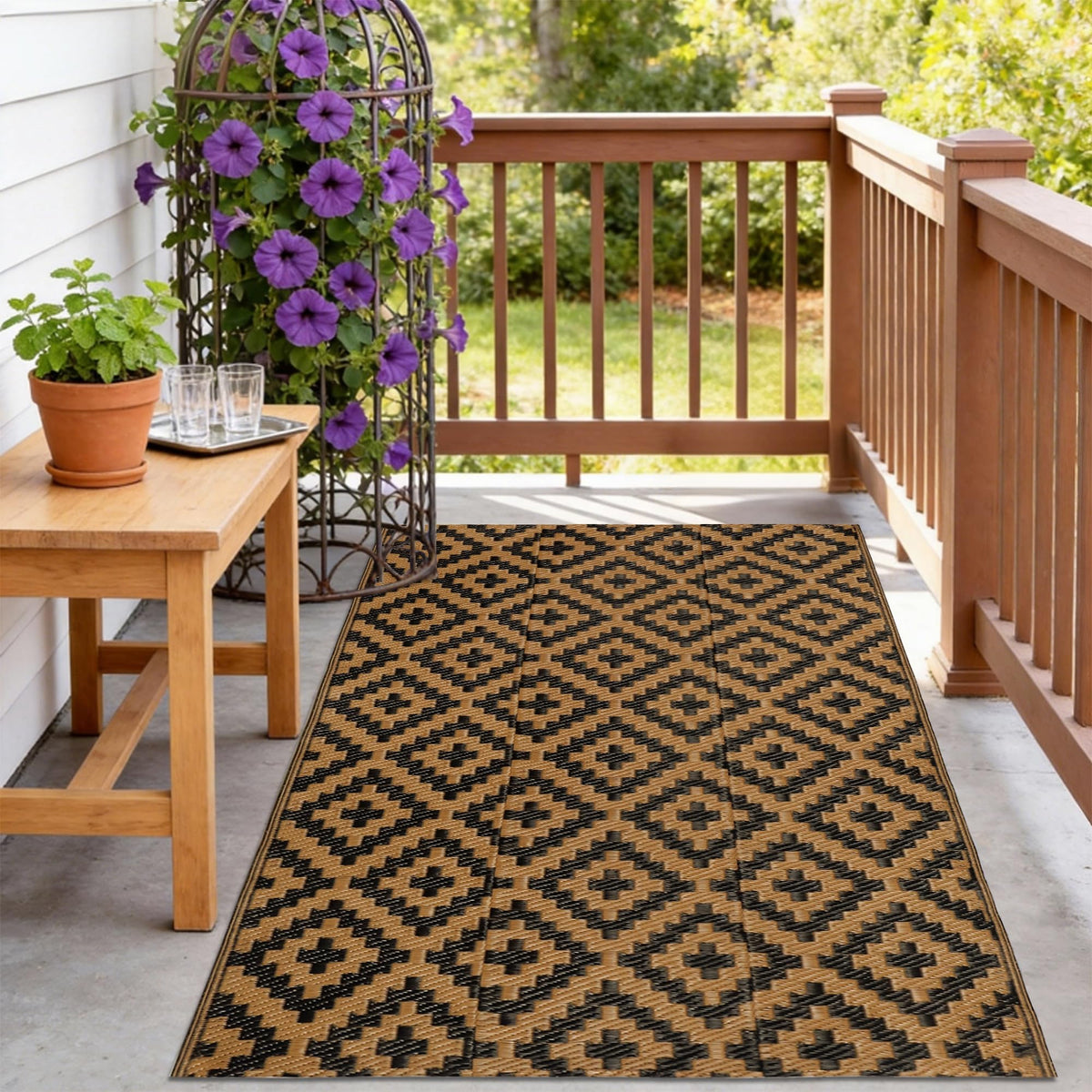 Front view of SAND MINE reversible outdoor rug in black and brown