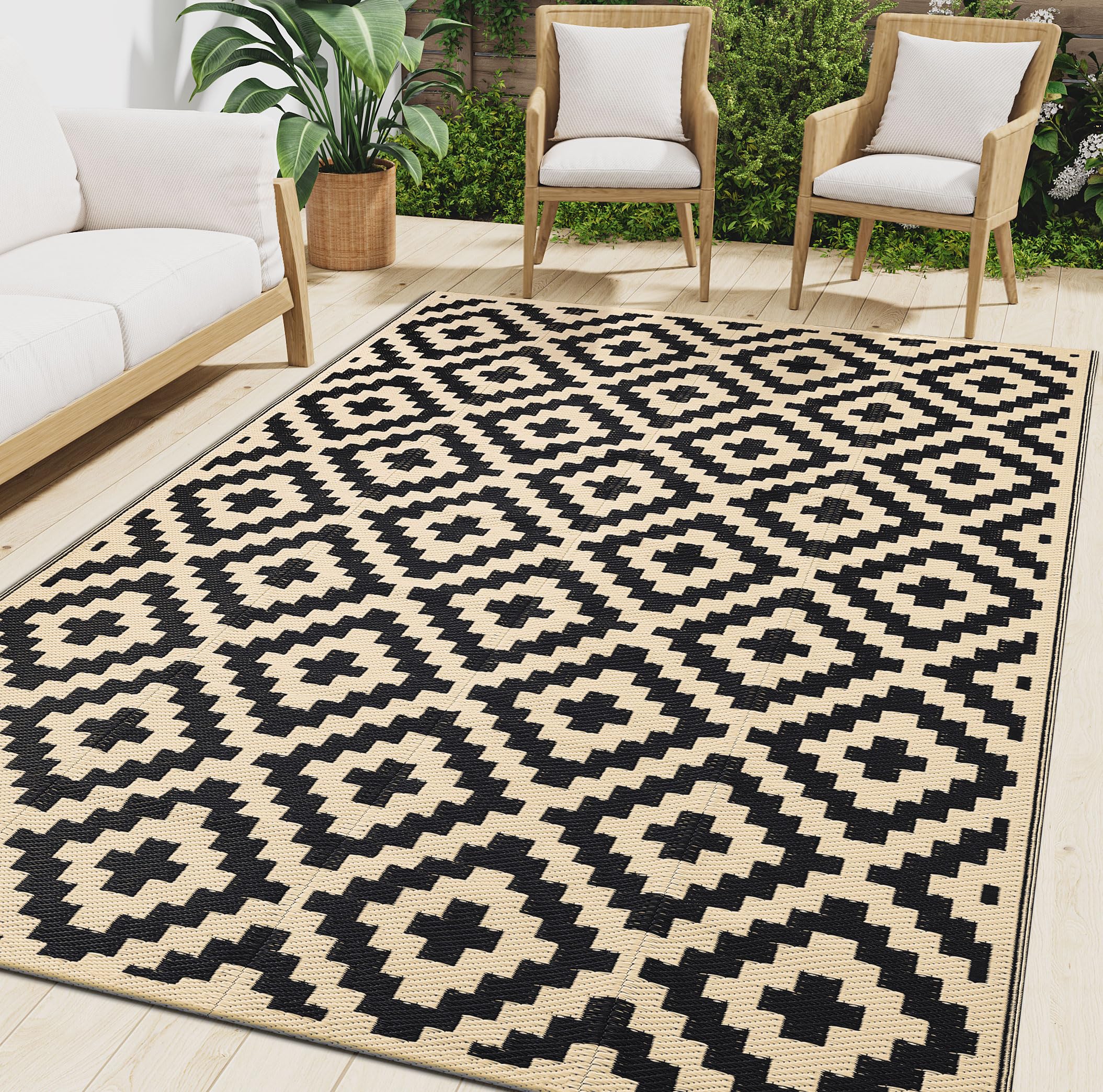 Front view of Smiry Outdoor Rug 5x8 ft in black and beige