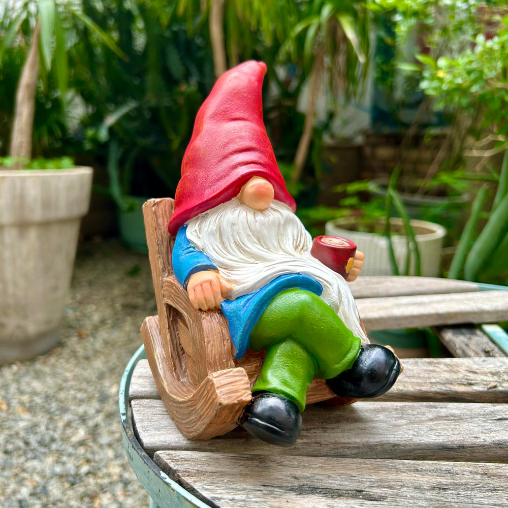 Front view of the Generic Coffee Drinking Gnome Statue holding a coffee cup