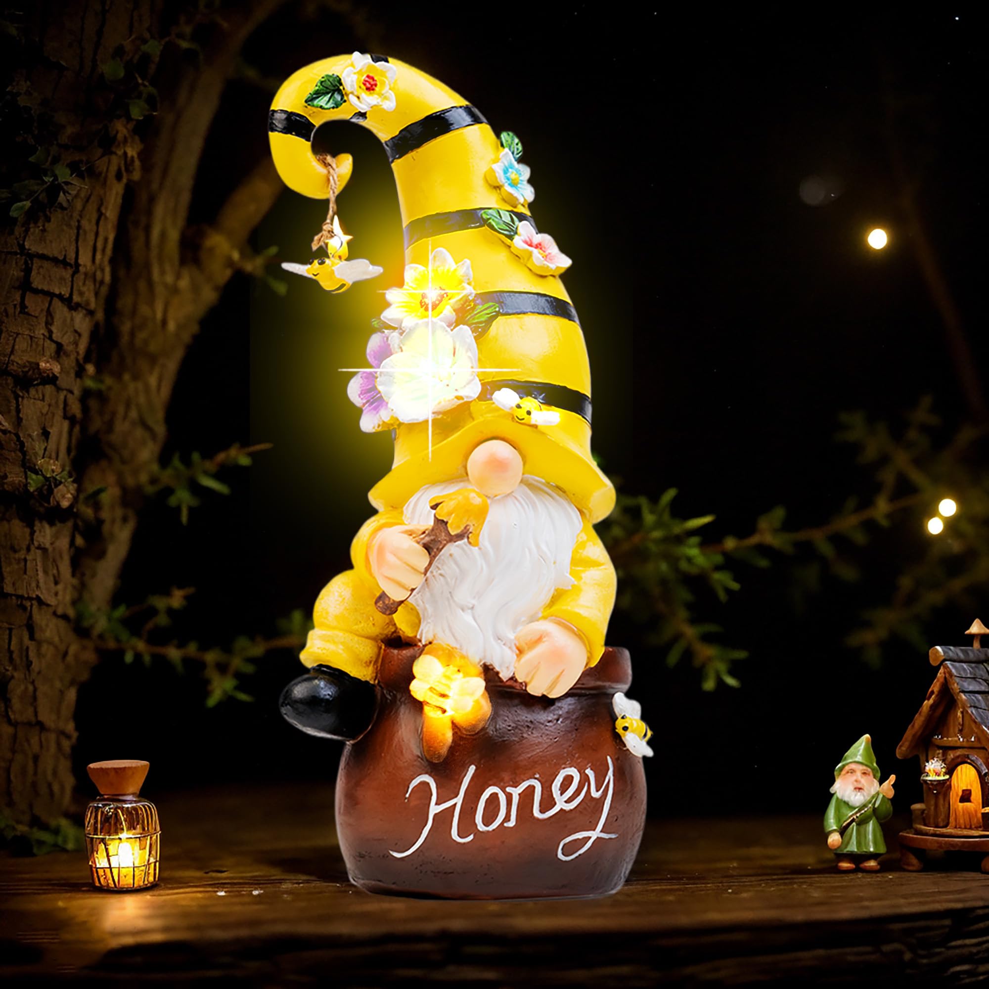 Front view of twinbling 13.3-inch Garden Solar Spring Gnome Statue in yellow-bee