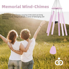FSVGYY wind chimes hanging outdoors with greenery