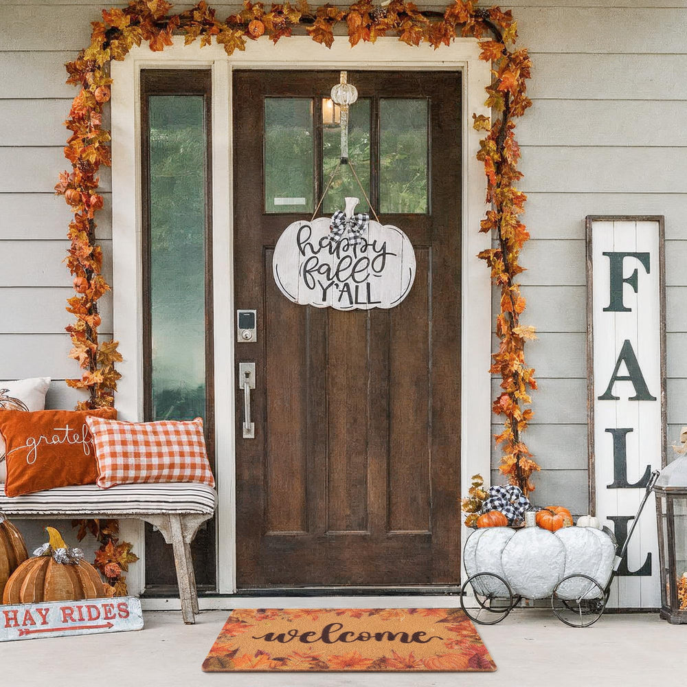 Fttoyoly doormat in garden setting with autumn leaves around it
