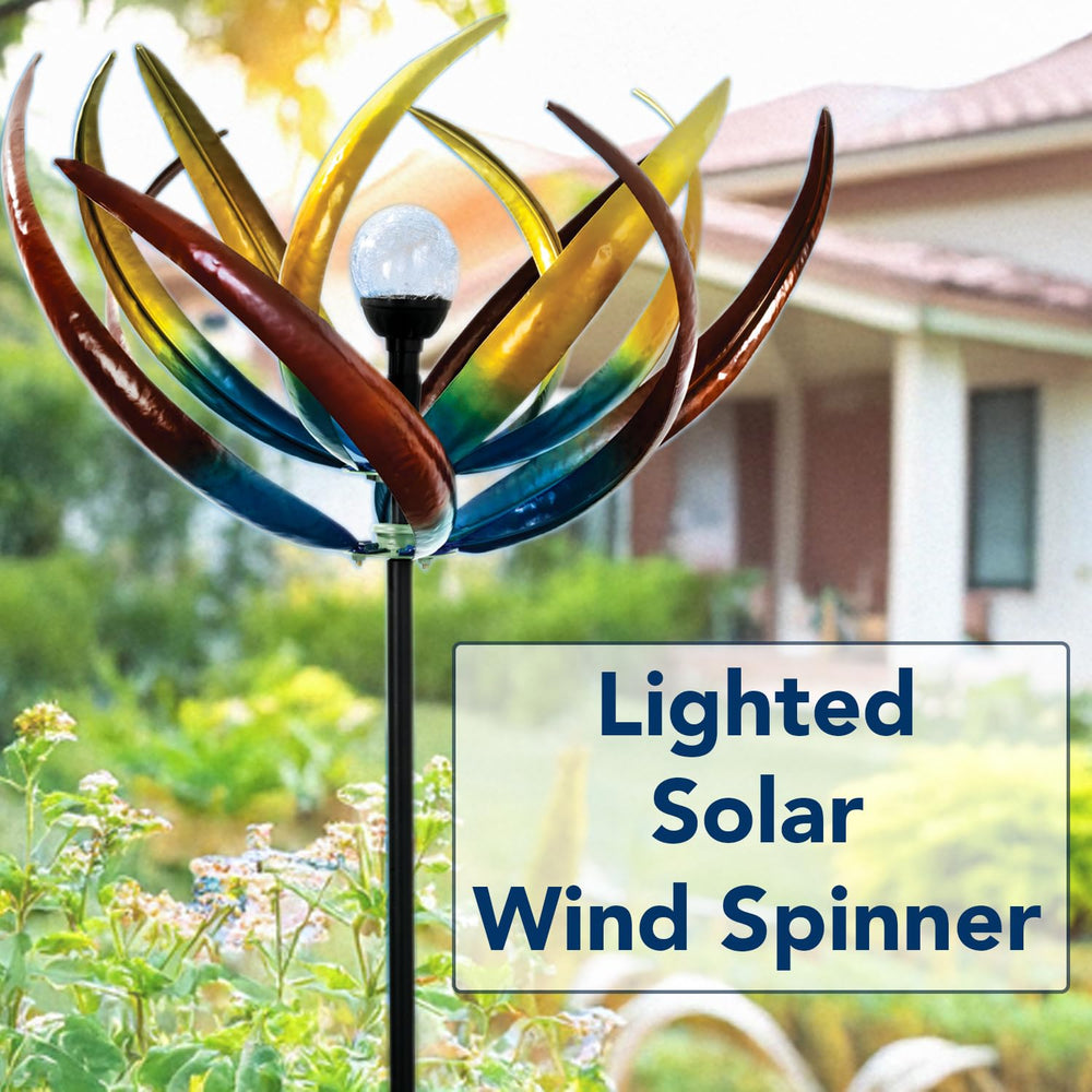 Full view of the Bits and Pieces Tulip Wind Spinner from distance in garden