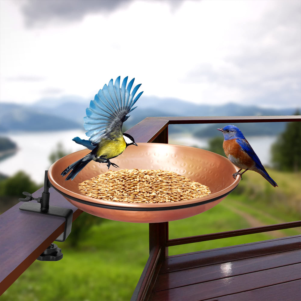 Full view of the decorative bird bath in a garden setting