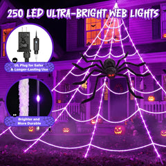Full view of the spider web lights draped over a fence