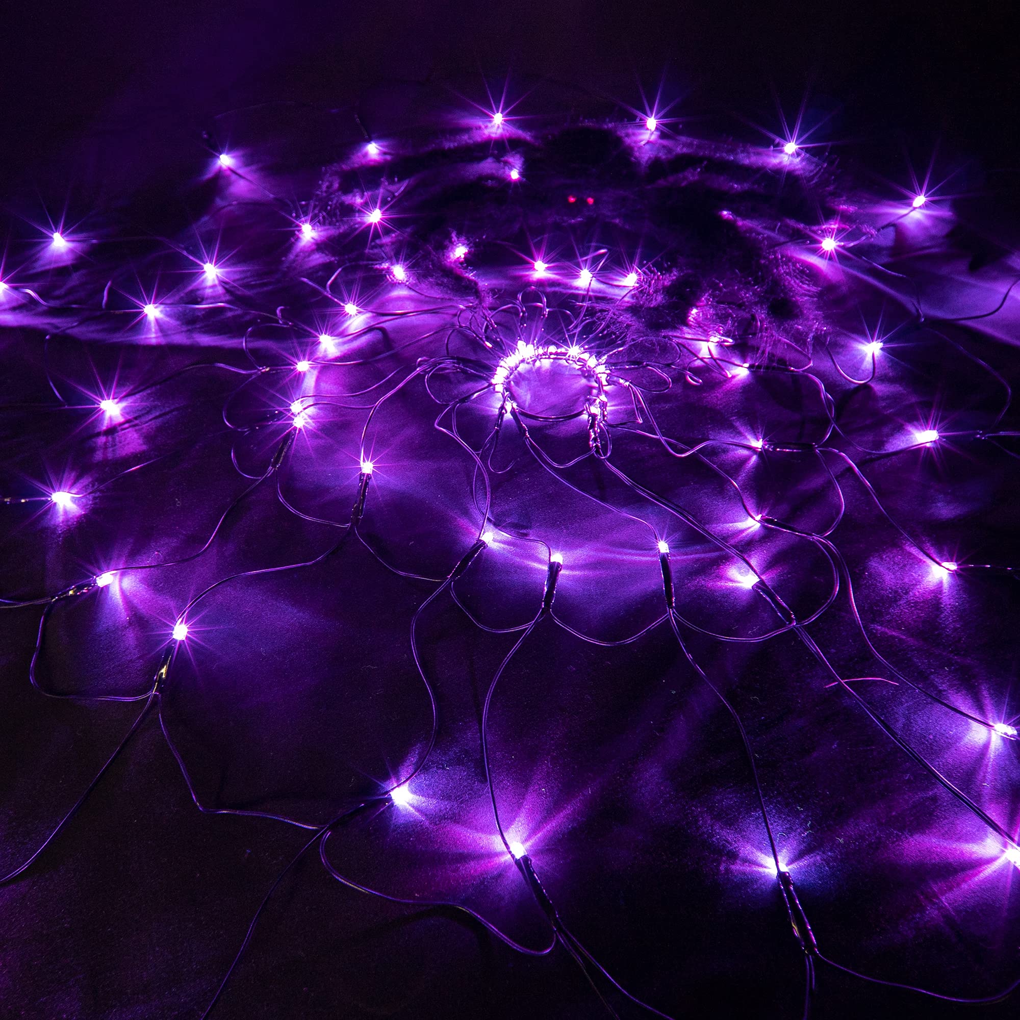 FUNPENY Halloween Spider Web Lights displayed in outdoor garden