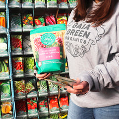 Gaia Green Power Bloom Organic Fertilizer in use on flower beds