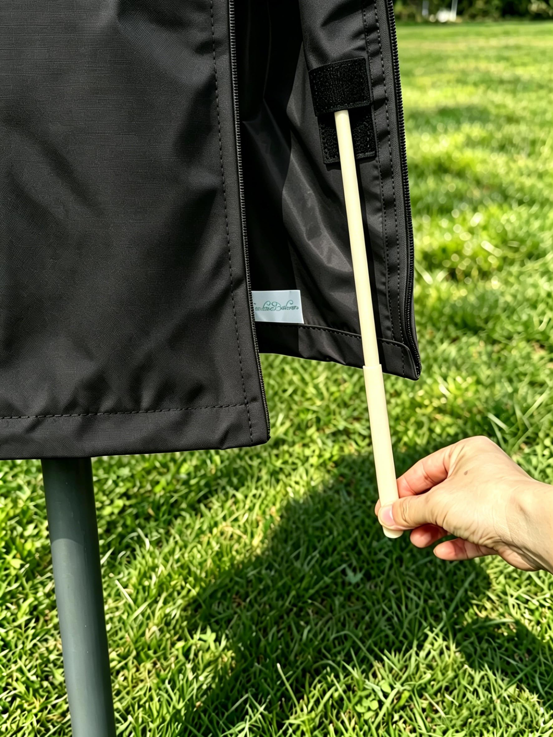 Garden Balsam umbrella cover black folded for storage
