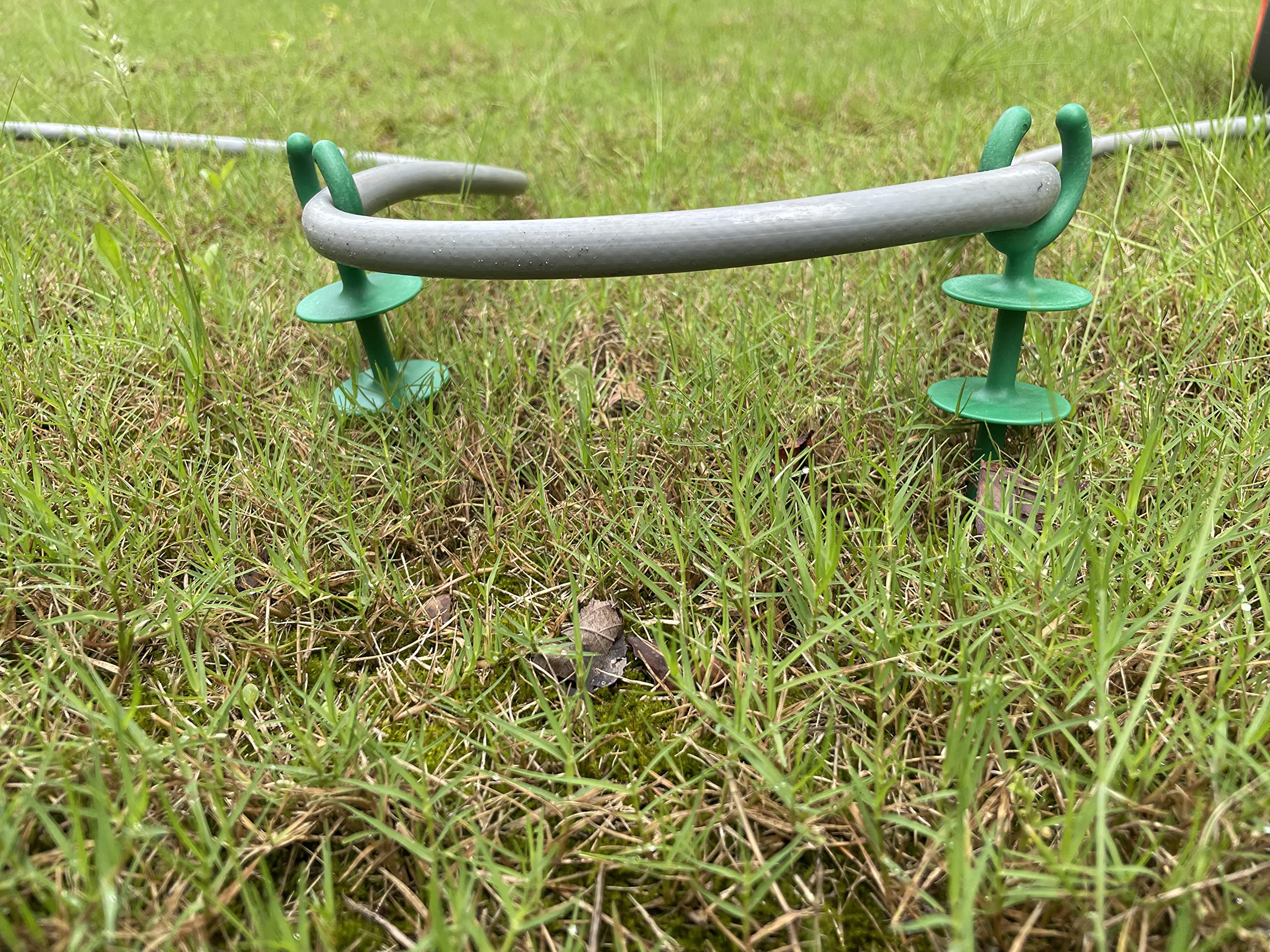 Garden hose holder stake installation process