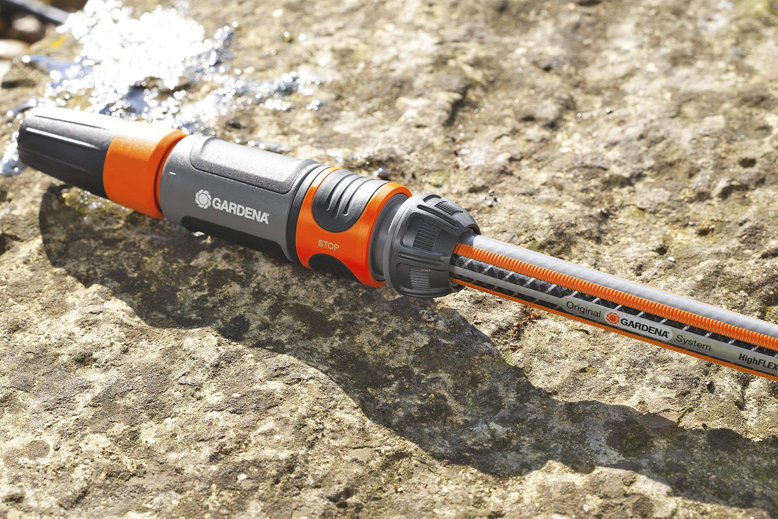 Gardena Cleaning Nozzle in use for garden cleaning