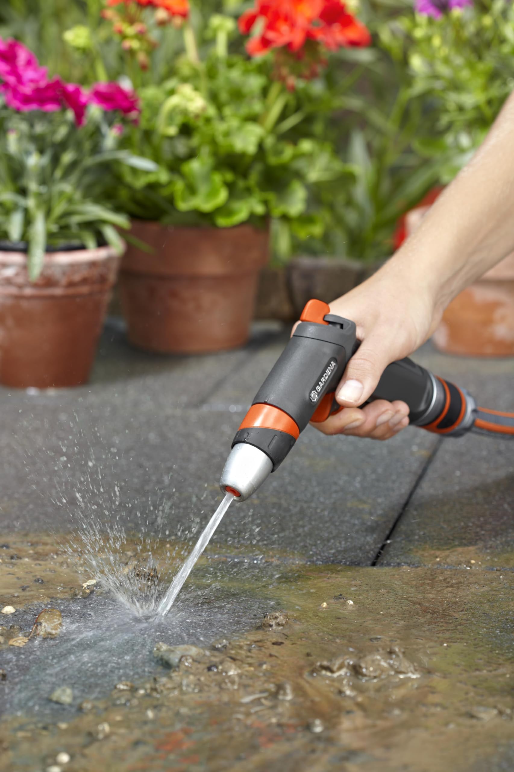 Gardena Premium Cleaning Nozzle with hose attachment showing durability