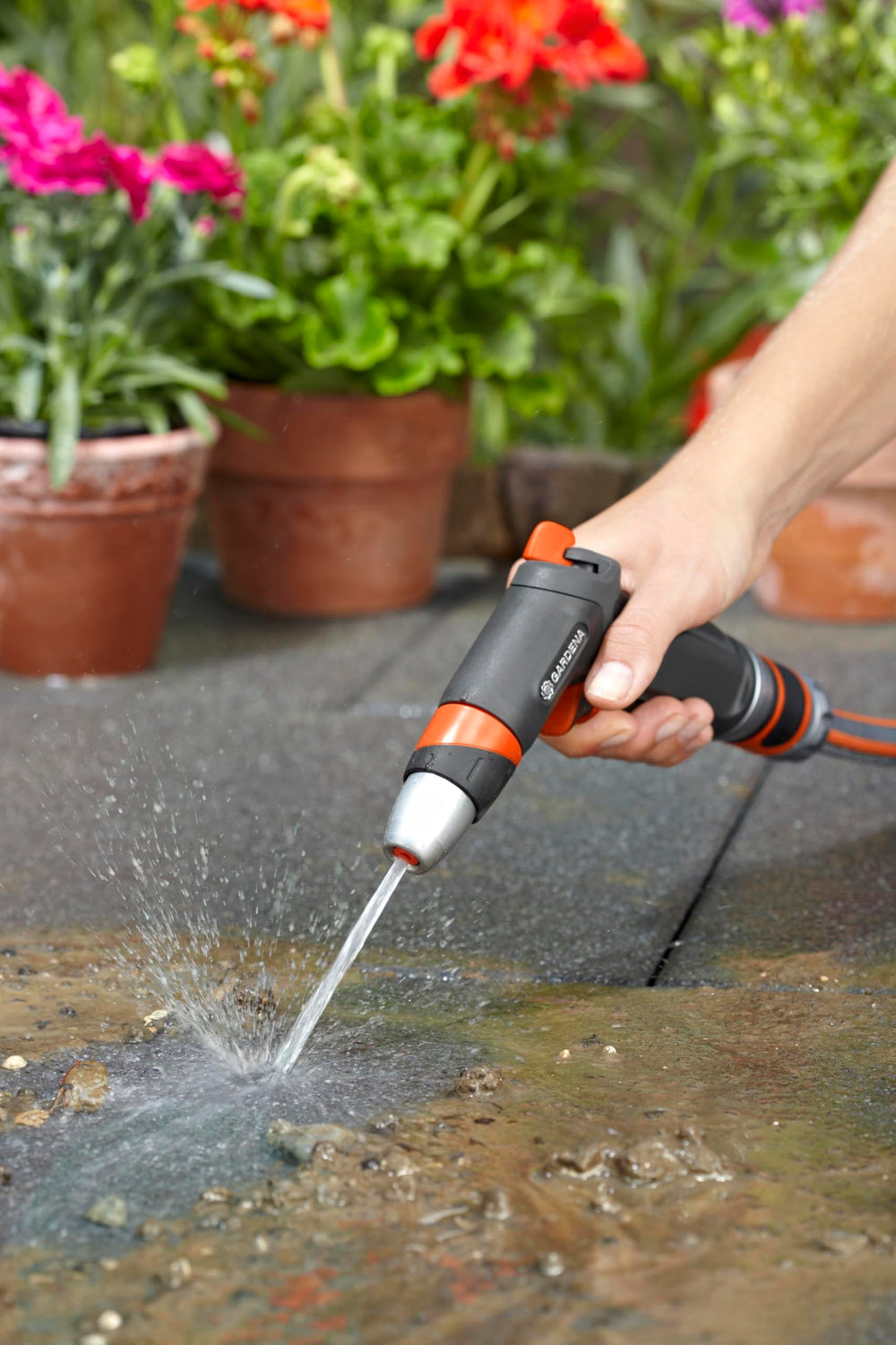 Gardena Premium Cleaning Nozzle with hose attachment showing durability