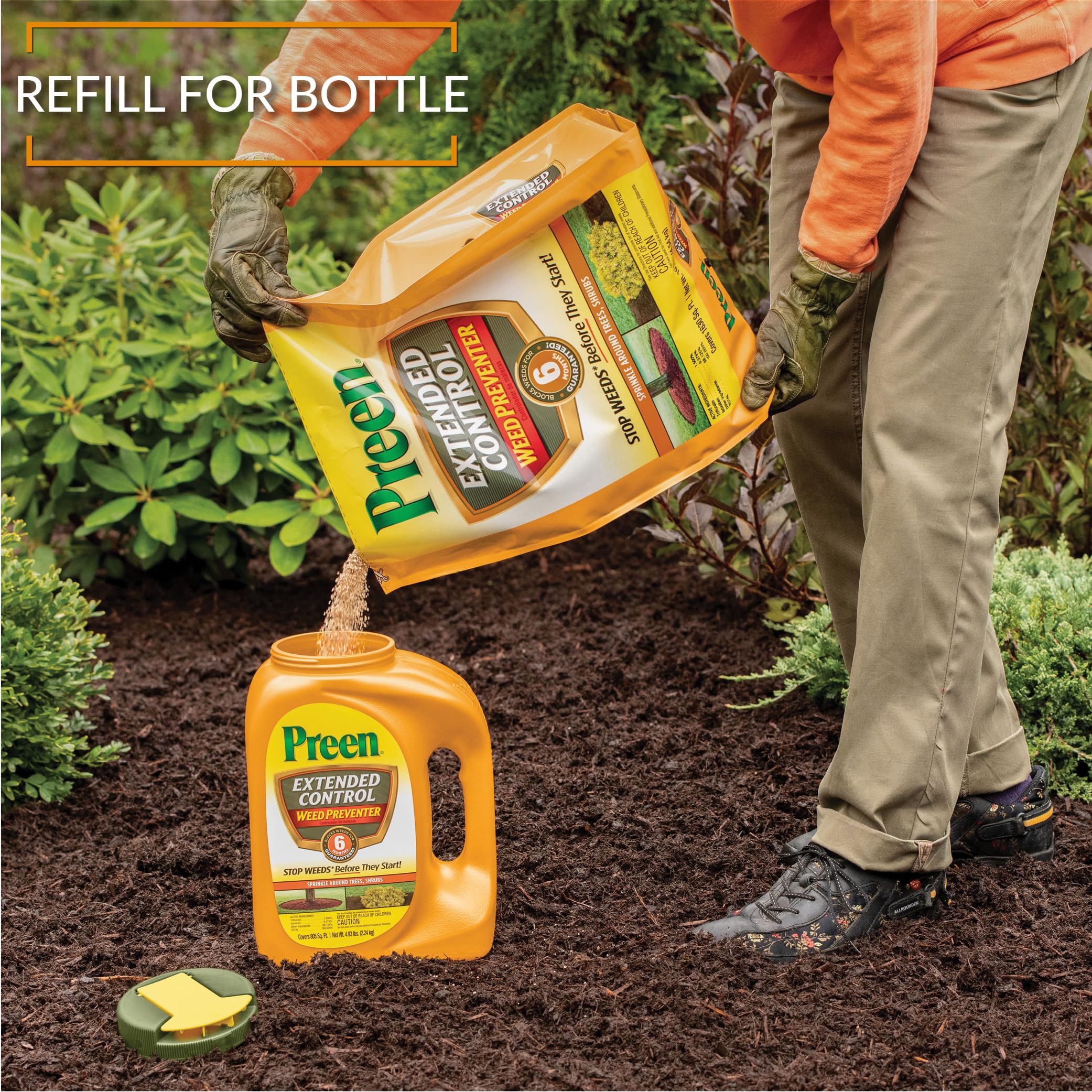 Gardener applying Preen Extended Control Weed Preventer