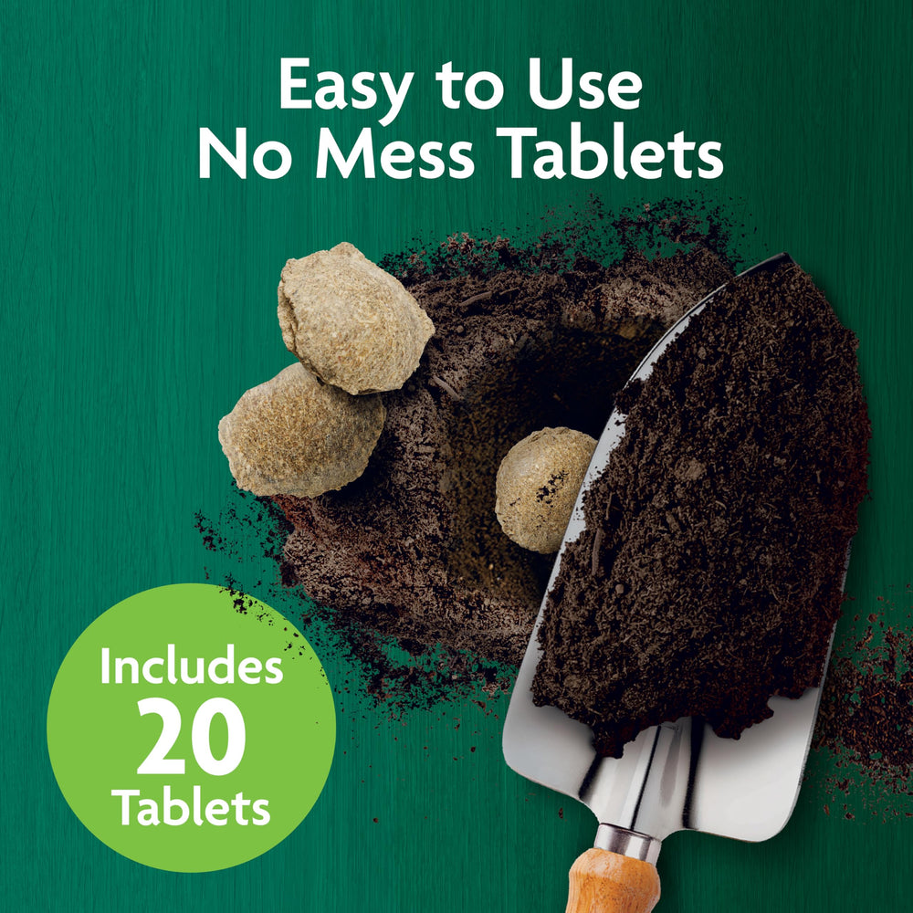 Gardener using Miracle-Gro Organic Planting Tablets for vegetables
