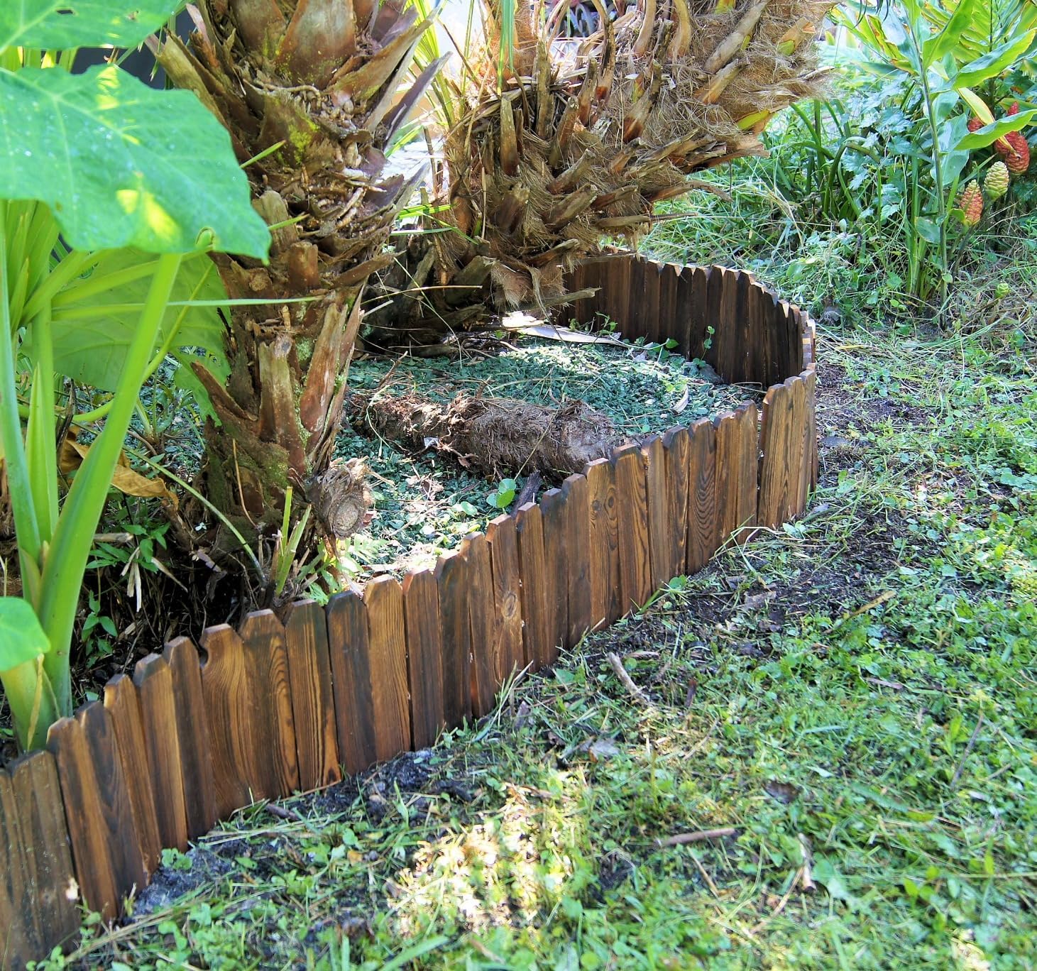 GardenFlow Wood Garden Edging showing installation around pathways