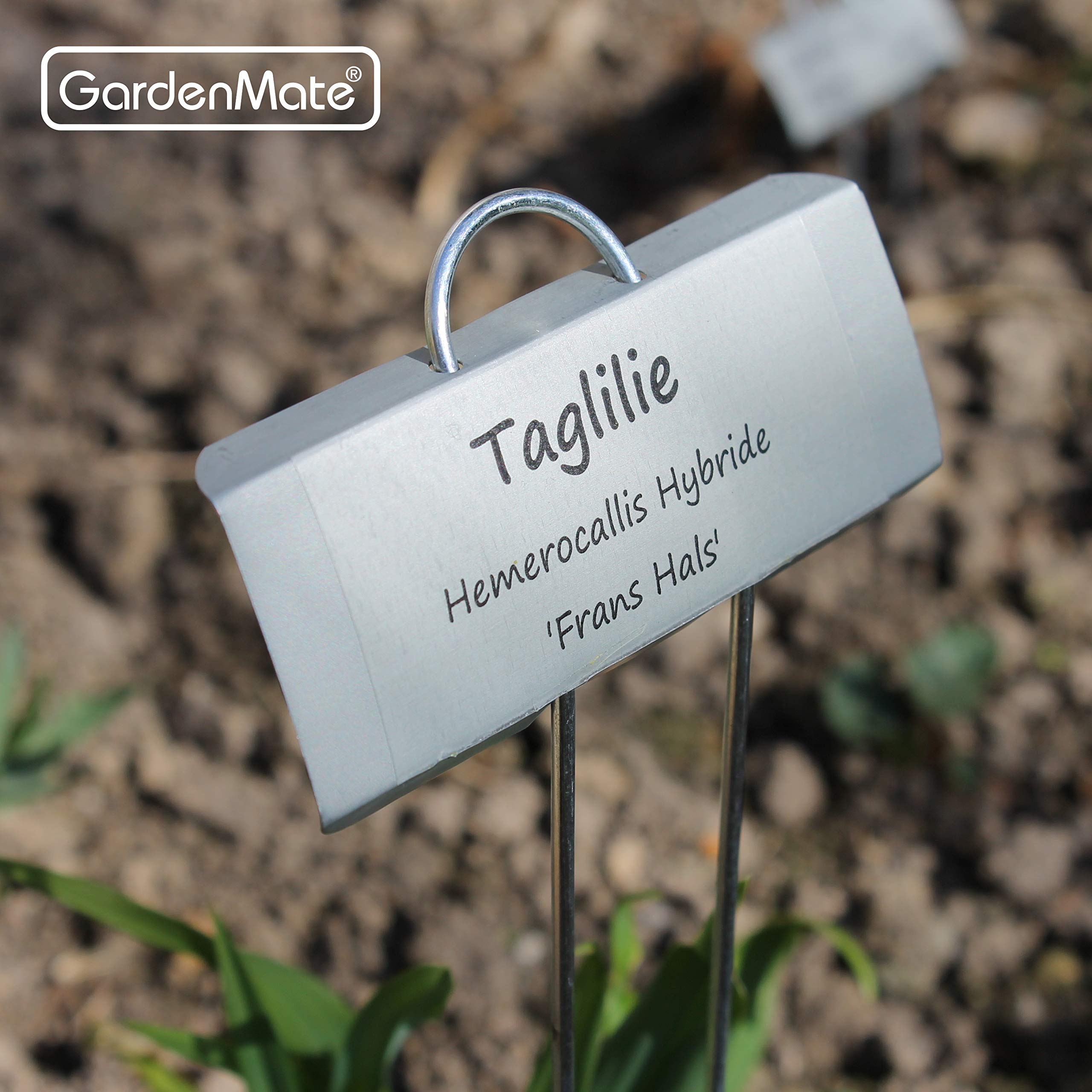 GardenMate plant labels displayed in a garden setting