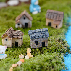Garneck Miniature Fairy Garden Houses in a terrarium