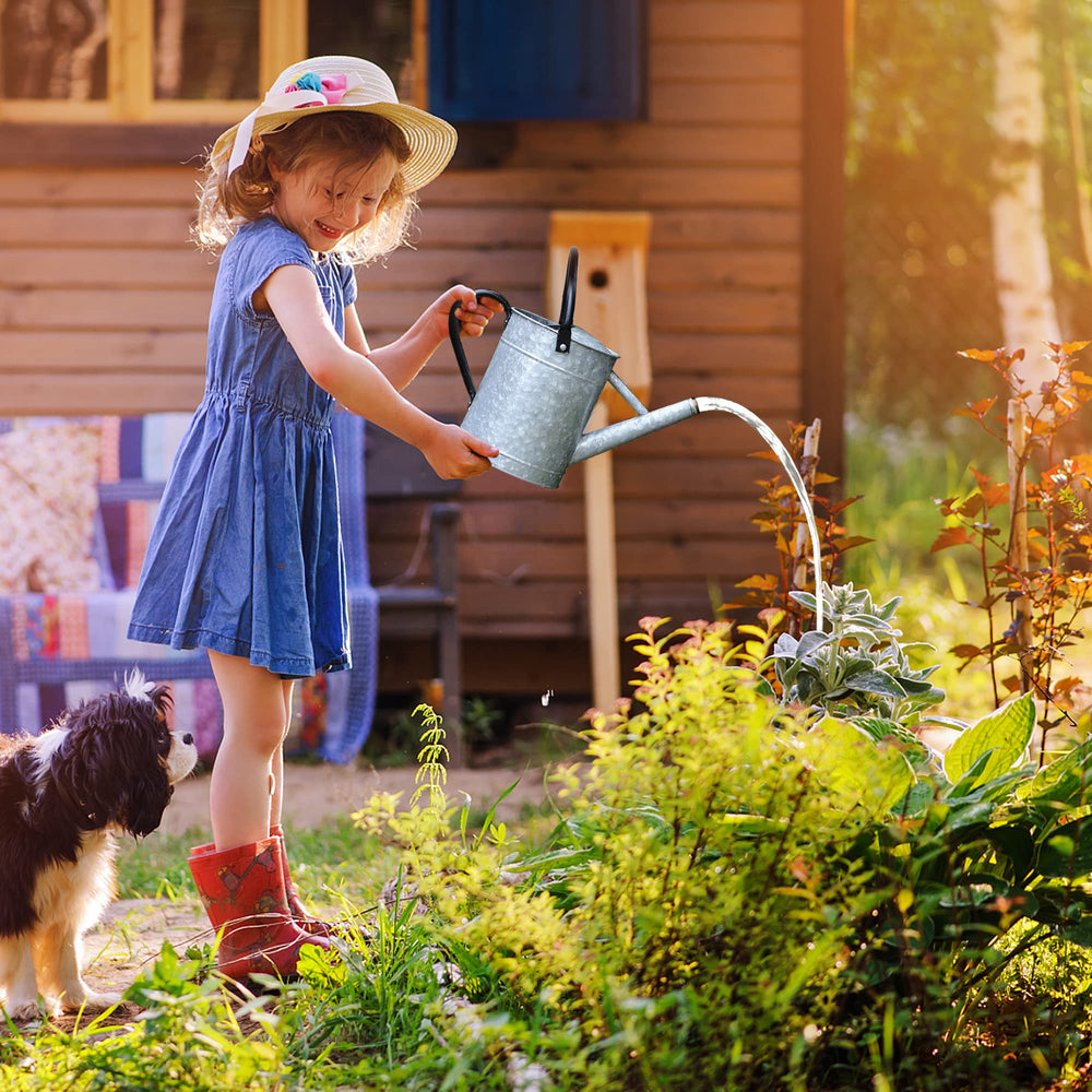 Garutom watering can placed on a garden table