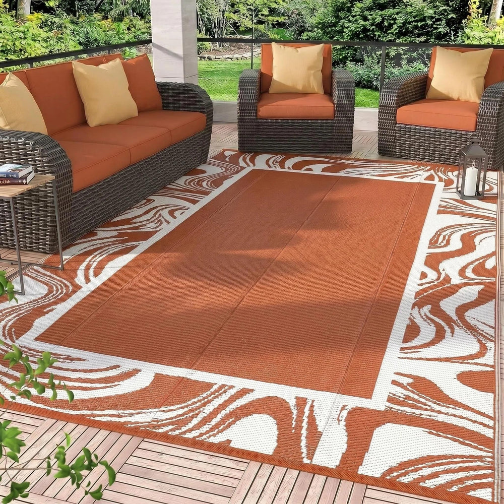 Garvee Outdoor Rug 5x8 front view with modern swirl border design