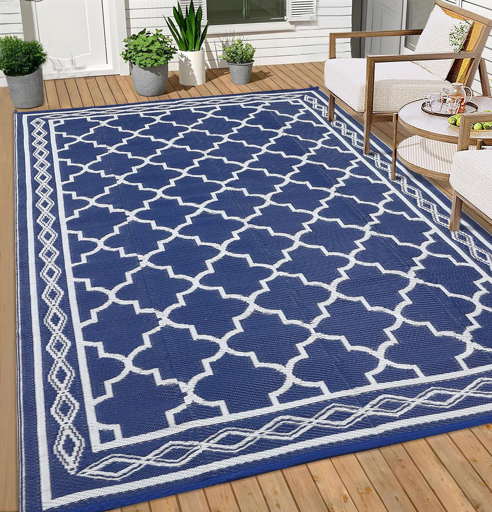 Garvee outdoor rug laid on a patio with furniture