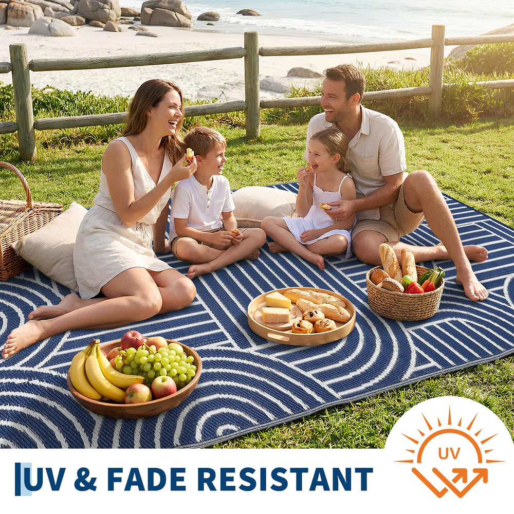 Garvee Reversible Rainbow Outdoor Rug 9x12 in outdoor setting on patio