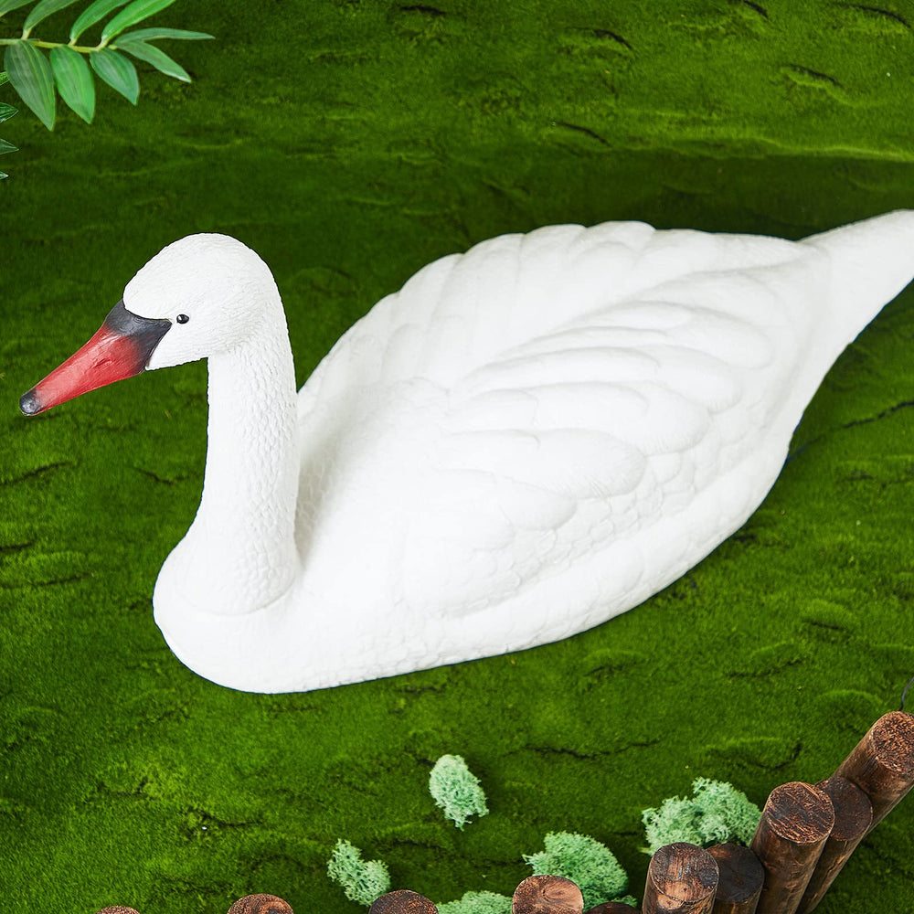 Geetery Swan Decoy displayed in a decorative bathroom setting