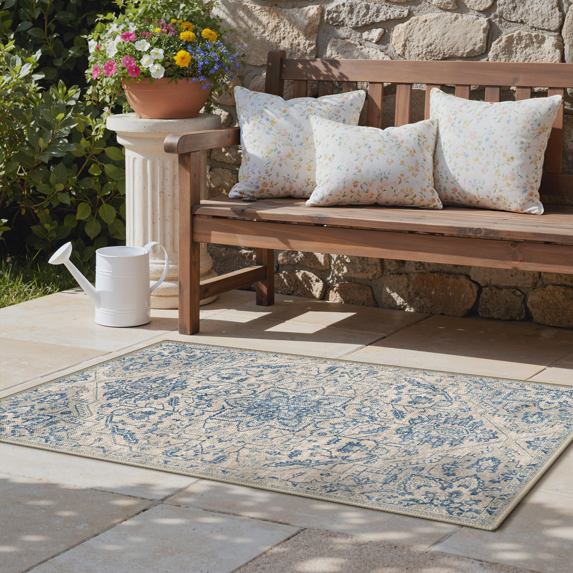 GENIMO 5x8 Outdoor Rug displayed in garden