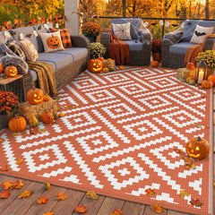 GENIMO 6'x9' Outdoor Rug front view with geometric patterns in orange and white