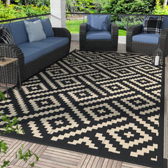 GENIMO 6'x9' outdoor rug in black and beige geometric pattern front view