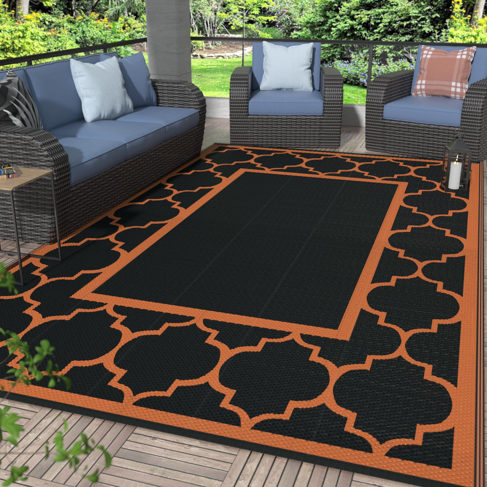 GENIMO 6'x9' Outdoor Rug in Black and Orange, front view
